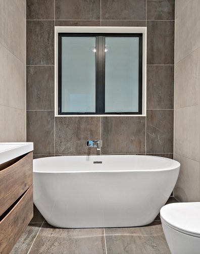 Modern sink, vanity and toilet in a new home in Auckland